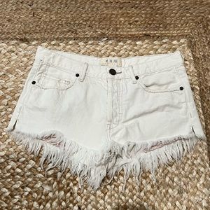 Free People ripped white jean shorts
